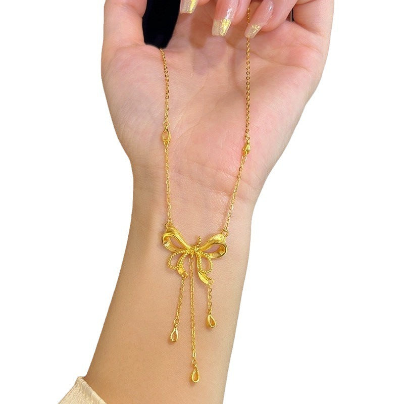 Gold Bow & Heart Tassel Necklace