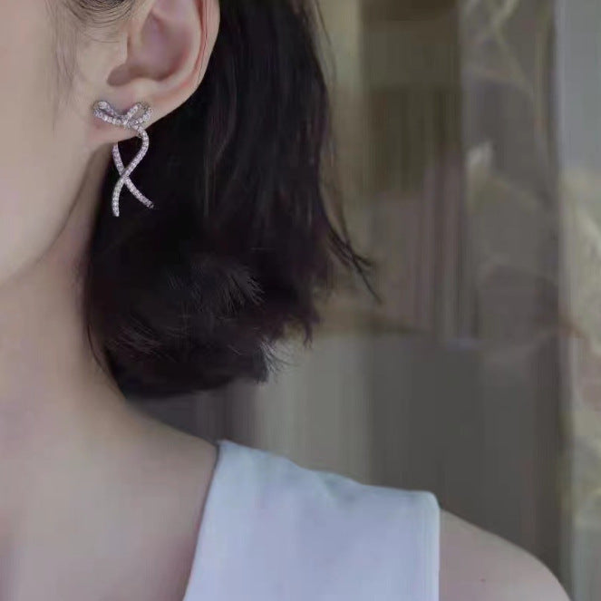 Women's Silver Stud Bow Earrings