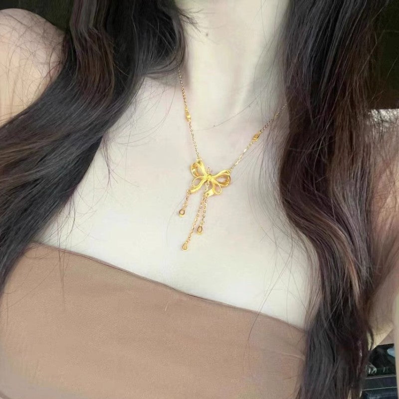 Gold Bow & Heart Tassel Necklace