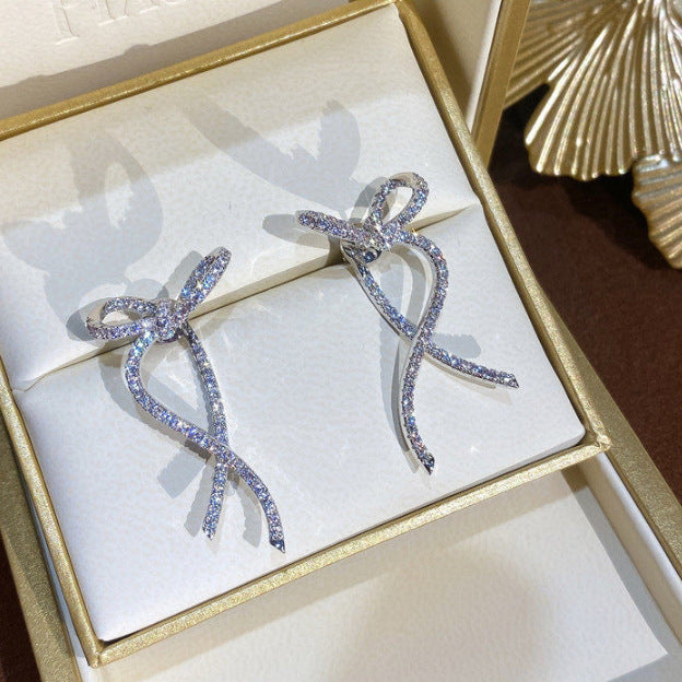 Women's Silver Stud Bow Earrings