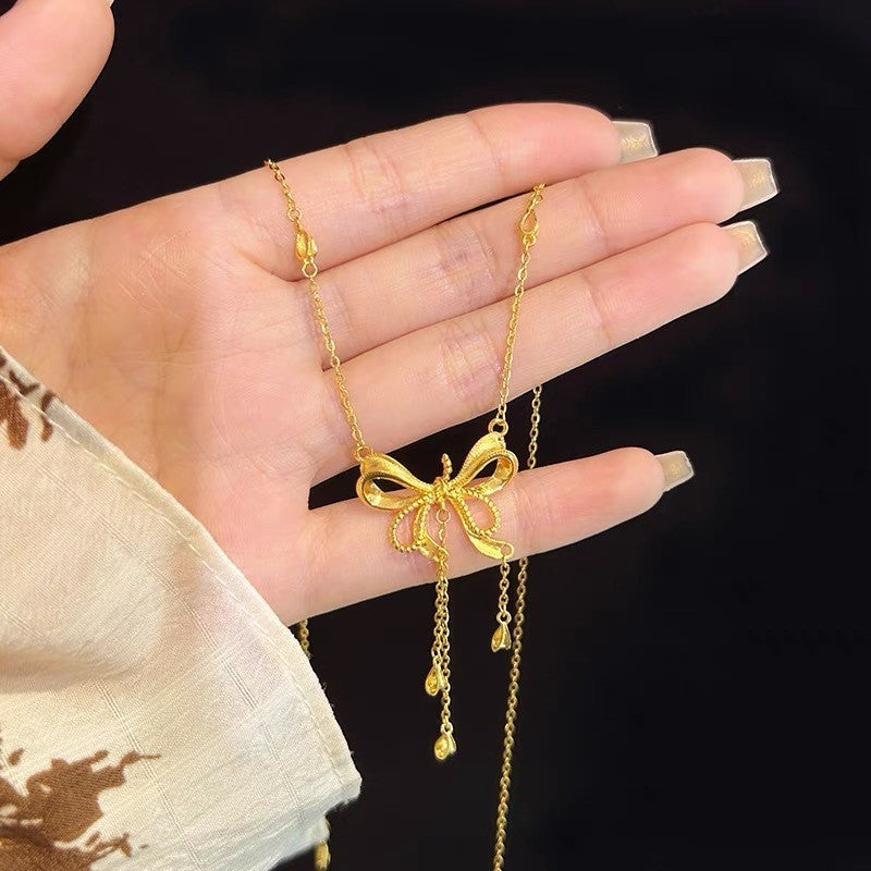 Gold Bow & Heart Tassel Necklace