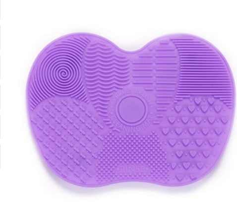 Makeup brush cleaning pad