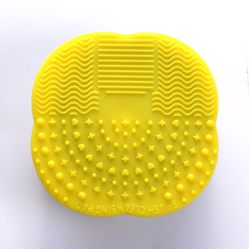 Makeup brush cleaning pad