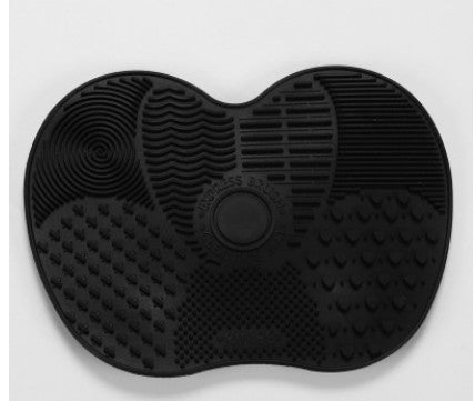 Makeup brush cleaning pad