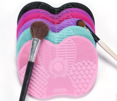 Makeup brush cleaning pad