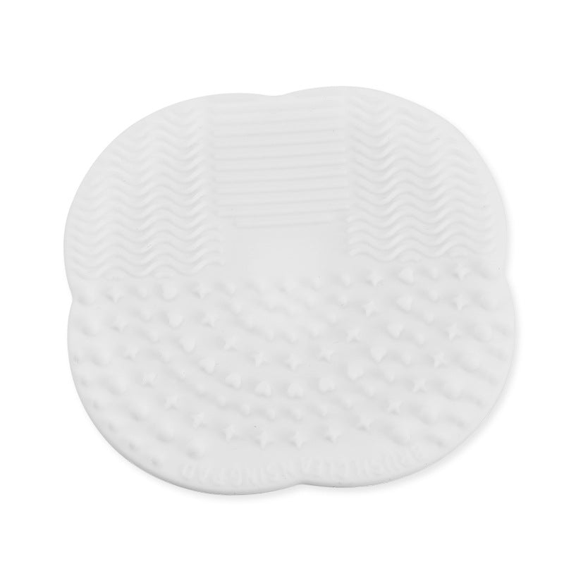 Makeup brush cleaning pad