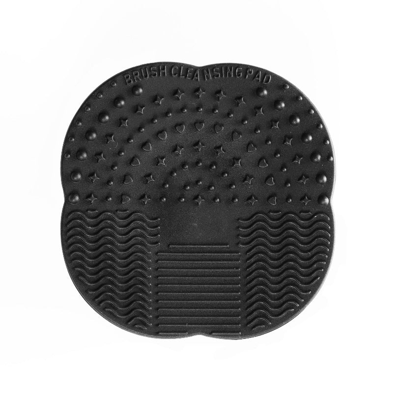 Makeup brush cleaning pad