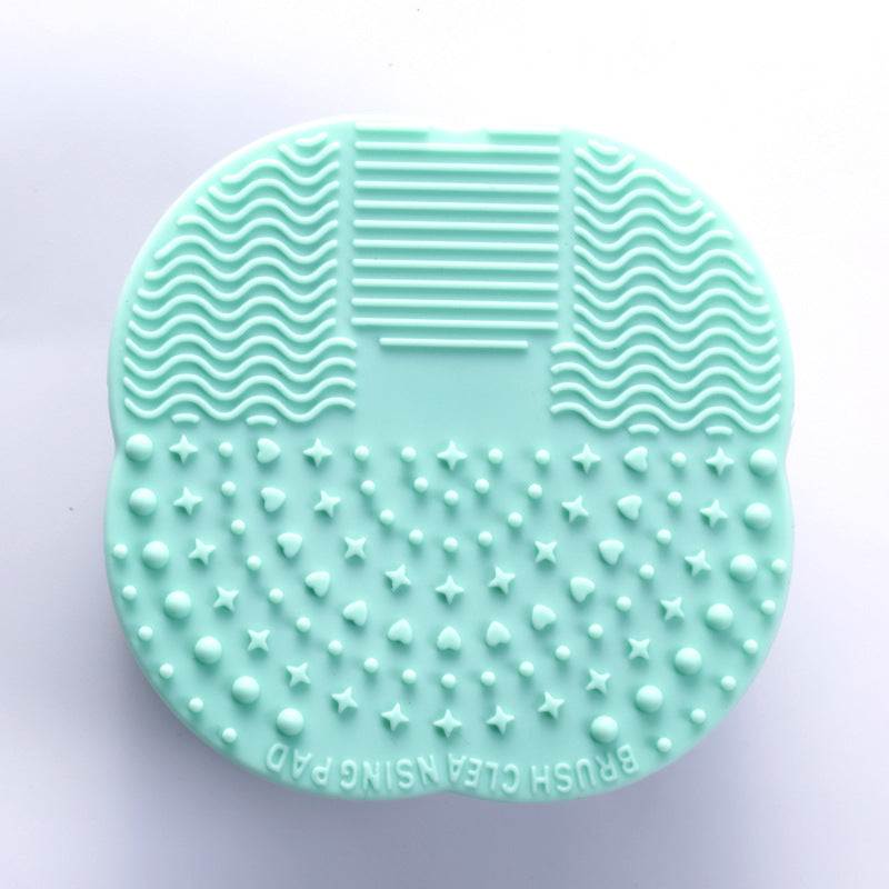 Makeup brush cleaning pad