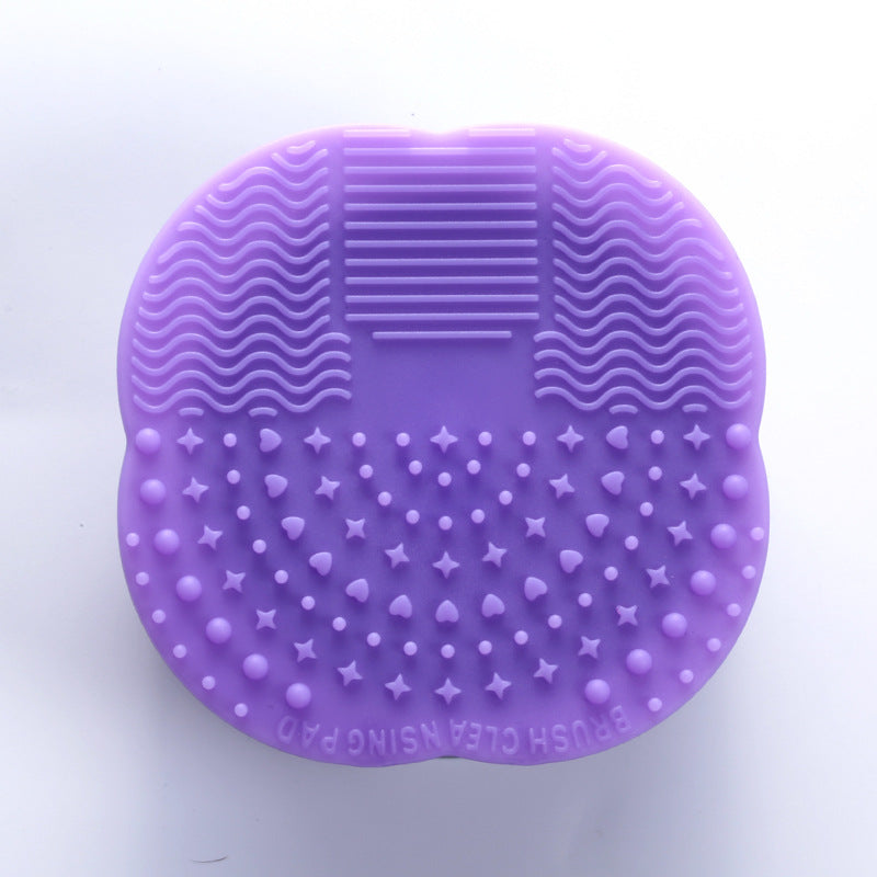 Makeup brush cleaning pad